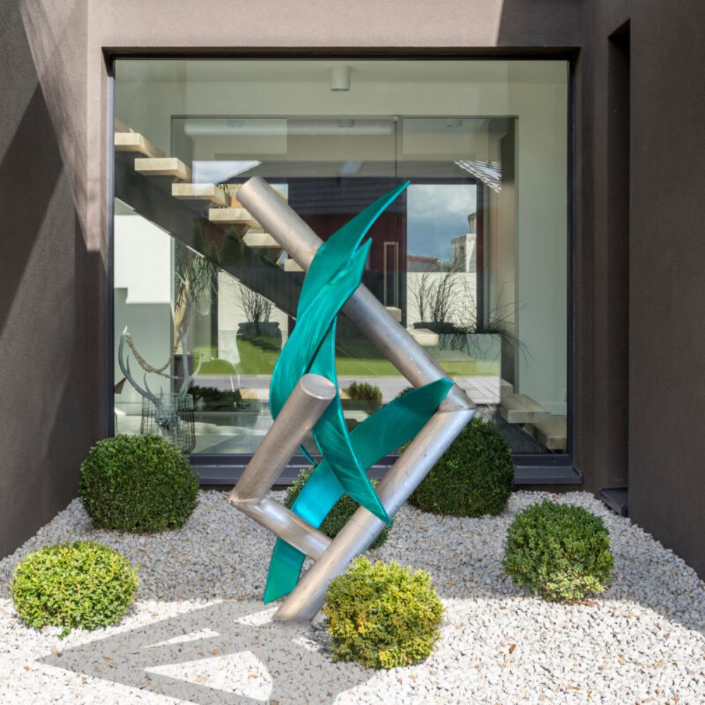Elevate Your Outdoor Space Using Metal Art This Summer
